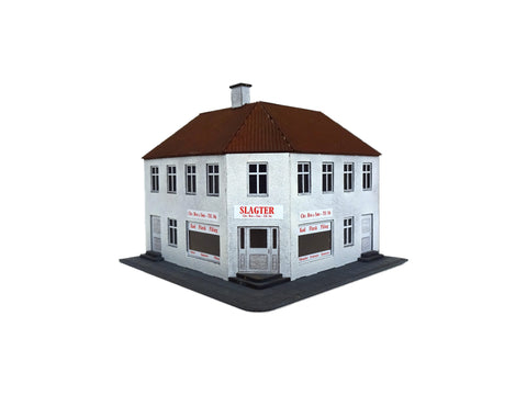 HT 87201 Hjørnehus med butik, hvid puds
